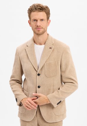 Beige Corduroy-Blazer mit vertikalen Streifen, featuring einen Reverskragen, einer Brusttasche, zwei Fronttaschen und schwarzen Knöpfen.