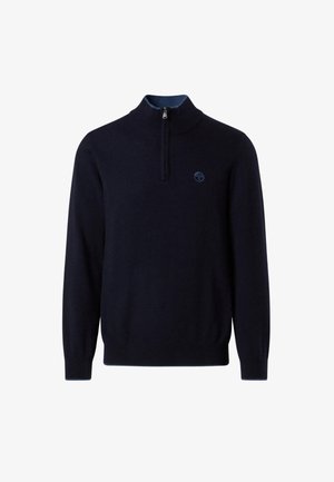 Navy Pullover-Sweater aus weichem Material. Mit hohem Kragen, einem Halb-Reißverschluss und einem kreisförmigen Logo auf der Brust.