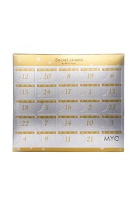 Calendario dell'avvento di gioielli di MYC Paris, caratterizzato da un design in oro e argento con porte numerate e motivi di fiocchi di neve su una scatola rettangolare.