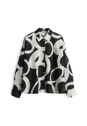 Zwart-witte overhemdd met abstracte cirkelpatronen, voorzien van een klassieke kraag en lange mouwen met een iets losse pasvorm.