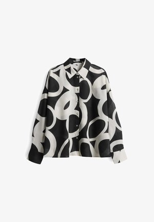 Zwart-witte overhemdd met abstracte cirkelpatronen, voorzien van een klassieke kraag en lange mouwen met een iets losse pasvorm.