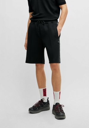 DESORT - Pantalones deportivos - black one