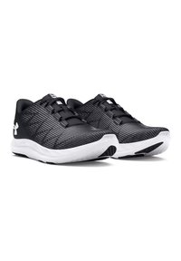 Sneakers neri con un motivo testurizzato, dotati di un design con lacci, dettagli grigi e una suola bianca con particolari neri.
