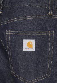 Carhartt WIP PONTIAC PANT MAITLAND - Tiesaus kirpimo džinsai - blue one wash