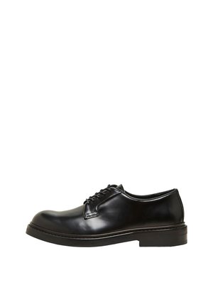 Black leather dress shoe with a rounded toe, lace-up design, and a low stacked heel. Smooth texture and minimalist style.