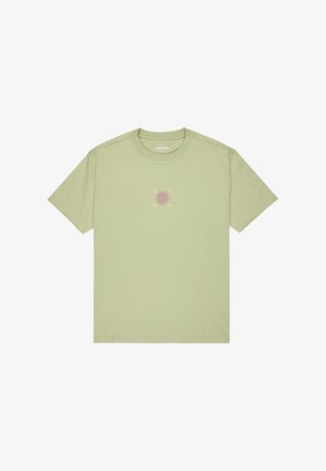 Light green cotton t-shirt with short sleeves and a crew neck. Features a pink sun graphic on the chest area. Smooth texture.