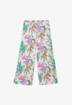Białe spodnie o szerokich nogawkach z jaskrawym tropikalnym kwiatowym wzorem w odcieniach różu, zieleni, niebieskiego i fioletu.