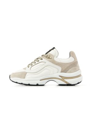 White and beige sneaker with chunky sole, suede and leather panels, and wavy light brown accent on the midsole.