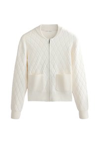 Veste zippée en maille couleur crème avec motif en losange, poignets, ourlet et col côtelés, et deux poches plaquées à l'avant.