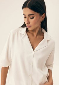 Henderson NILSA mleczny