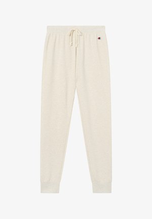 Beżowe spodnie dresowe z elastycznym ściągaczem w talii, prążkowanymi mankietami oraz małym logo Champion po lewej stronie u góry.