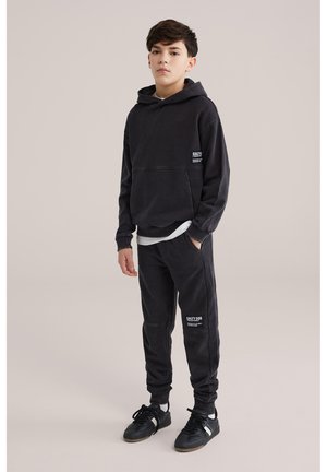 WE Fashion SALTY DOG - Donji dijelovi trenirke - black