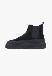 Black suede ankle boots with a textured elastic side panel, a pull tab at the back, and a chunky rubber sole for traction.