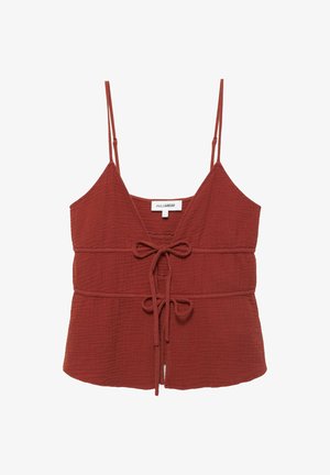 Rozsdavörös, texturált ujjatlan felső vékony, állítható pántokkal, mély V-nyakkivágással és két elől középen kötött masnival.