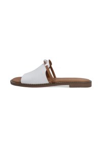 White slip-on sandals with a soft upper, brown sole, and decorative accents. Features open toe and two straps for support. Flat profile.