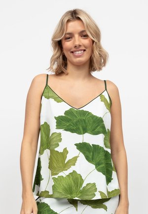 Witte tanktop met groen bladerenpatroon, met spaghettibandjes en een V-halsontwerp. Zachte stof met een relaxte pasvorm.