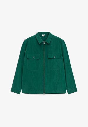 Dark green long-sleeve jacket with pointed collar, full front zipper, and two buttoned flap chest pockets.