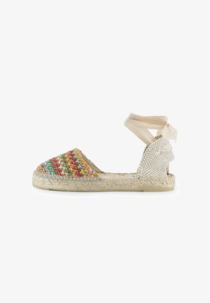 Bunte gewebte Espadrilles mit mehrfarbigen Mustern an der Spitze, beigem gewebtem Rücken und hellbeigen Riemen zum Binden am Knöchel. Flache Jutesohle.