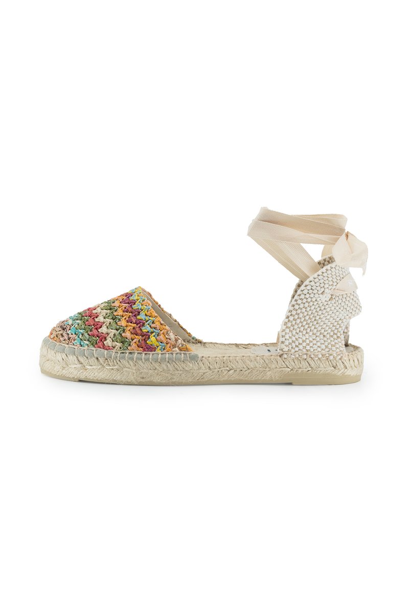 Espadrille intrecciata colorata con motivi multicolori sulla punta, retro intrecciato beige e nastri per la caviglia di un leggero beige. Suola piatta in fibra di juta.