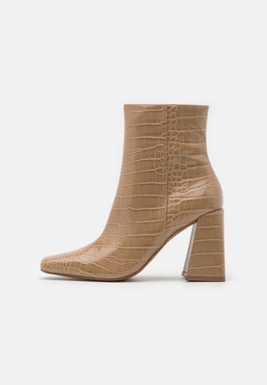 Stivaletti con tacco - beige
