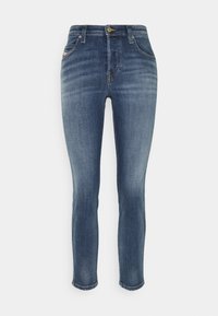 Mörkblå denimjeans med slim fit, med en klassisk design med fem fickor och ett stängning med knapp fram. Subtil blekning och texturdetaljer.