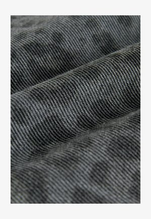 Gray woven fabric with a textured surface, featuring a subtle striped pattern. The material appears soft and flexible, suitable for clothing.