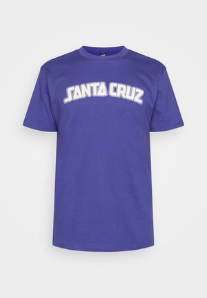 T-shirt en coton violet à col rond et manches courtes, avec une impression graphique blanche "SANTA CRUZ" sur la poitrine.
