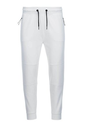 Vita joggers tillverkade av mjukt material, med en elastisk midja och svarta dragsnören samt subtil sömdetaljering på benen.