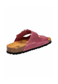 Pink leather slide sandal with a cork footbed, adjustable strap, and black rubber outsole, featuring cut-out design for breathability.