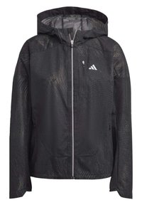 Giacca nera con cappuccio e finitura testurizzata, dotata di cerniere argentate e una piccola tasca frontale. Include un logo Adidas bianco sul lato sinistro del petto.