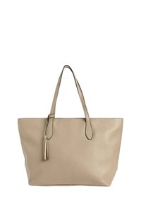 Sac fourre-tout en cuir beige avec deux poignées, présentant un détail de frange et des coutures foncées contrastantes le long des bords.