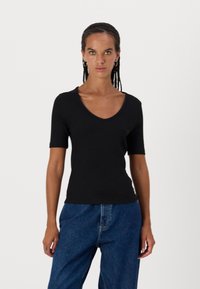 Calvin Klein Jeans V NECK TEE - Camiseta básica - black