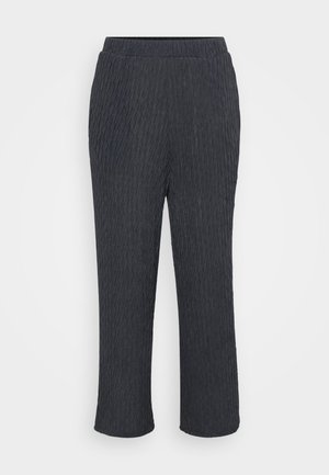 Pantalons gris foncé avec un design texturé et côtelé, dotés d'une taille élastique et de jambes fuselées. Fabriqués en matériau léger et doux.