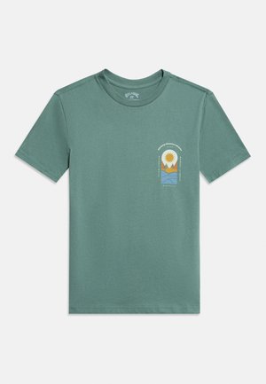 Green short-sleeve T-shirt with a small colorful graphic of sun, trees, mountains, and water on the left chest.