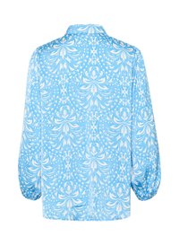 Kék blúz fehér virágmintával, gallérral és puffos ujjal. Simás anyag, amely könnyed, légies textúrával rendelkezik.