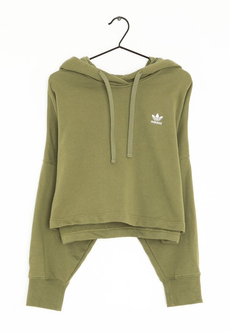Haut en olive cropped en tissu doux, avec une poche frontale, un capuchon à cordon et un logo Adidas blanc sur la poitrine.