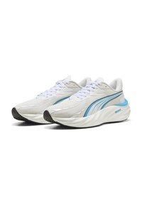 White running shoes with a textured upper, featuring blue accents and a thick, cushioned sole. Grey rubber outsole for traction.