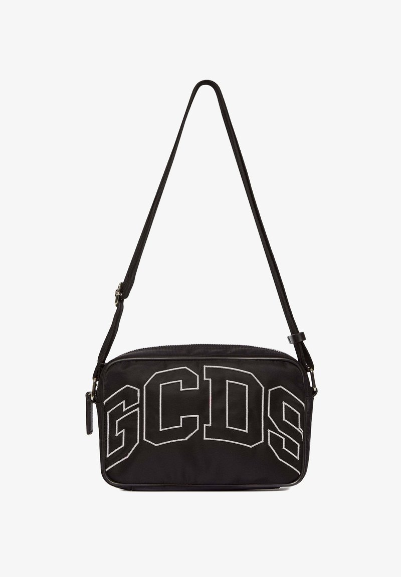 Black fabric crossbody bag with "GCDS" printed in bold white letters. Features a zip closure and a thin adjustable strap.