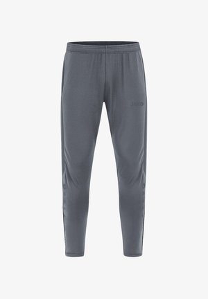 Gray athletic pants made of stretchy fabric, featuring a tapered design, elastic waistband, and side buttons for adjustable fit. JAKO logo displayed.