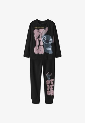 Black long-sleeve pajama set featuring a large graphic of Stitch on the top and smaller graphic on the pants. Smooth cotton material.