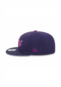 Purple cap with a flat, patterned brim. Features embroidered detailing and a small pink logo on the side. Made from textured fabric.