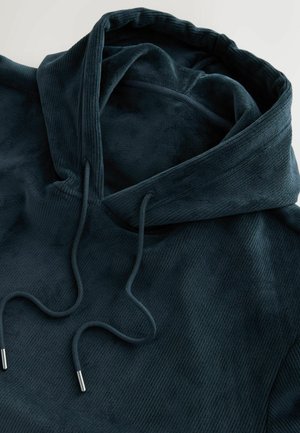 Temnozeleni kapučni pulover iz mehkega, strukturiranega blaga, z rebrastimi detajli in vrvicami z metaliziranimi konicami.