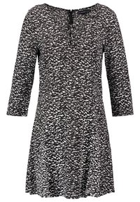 Robe mi-longue noire et blanche à motifs, manches trois-quarts et petit détail noué au col rond.