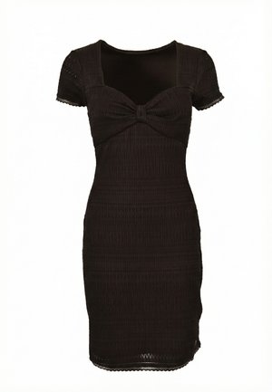 Schwarzes, geripptes, figurbetontes Kleid mit kurzen Ärmeln, quadratischem Ausschnitt und Knoten-Detail an der Brust, knielang mit geschwungenem Saum.