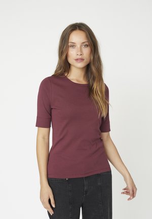 Burgundy short-sleeve top made from soft fabric with a crew neckline, featuring a fitted silhouette and subtle seam details.