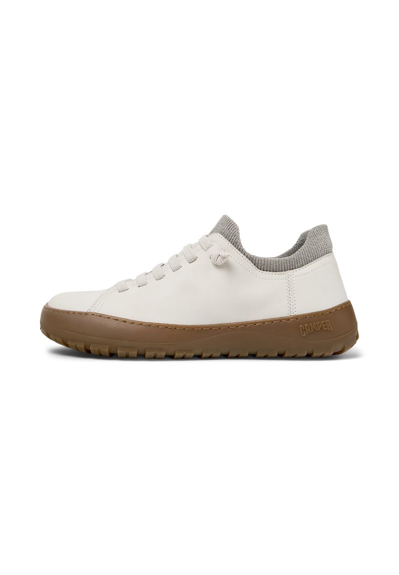 White leather sneaker with grey knitted collar, lace-up design, and brown rubber sole featuring textured grip and subtle branding on the side.