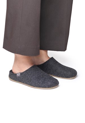 Gray felt slippers with a rounded toe, open back, and a textured upper. Rubber sole with multicolored speckles visible along the edge.