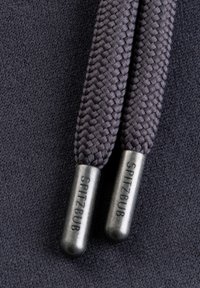 Dark gray textile with braided shoelaces featuring metallic aglets marked "SPITZBUB." The design is functional and durable.