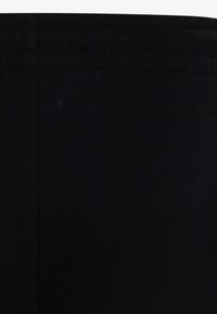 Jordan BROOKLYN ESSENTIALS PANT - Pantalones deportivos - black