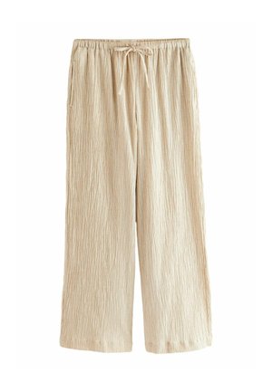 Pantaloni beige leggeri a gamba larga con texture plissettata, vita elastica e cordoncino regolabile. Presentano tasche laterali.